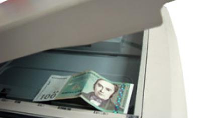 Pinigai lindo iš spausdintuvo